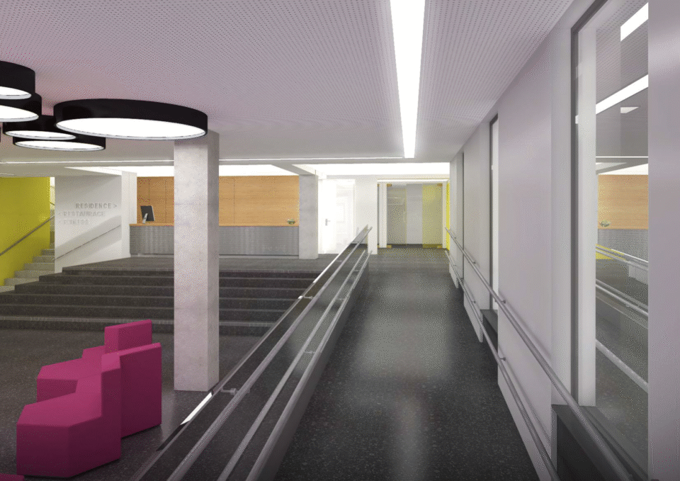 Moderní interiér se světlými stěnami a černou podlahou vybavený růžovými sedacími prvky a rampou pro bezbariérový přístup poskytuje elegantní a stylové prostředí.